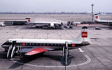 Airplane Picture - British European Airways Hawker Siddeley Trident at London Heathrow Airport (in the centre background) in 1964. In front is a BEA Vickers Viscount and on the right a BEA Vickers Vanguard
