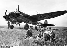 Airplane Picture - A German crew rest next to their Ju 88A variant, summer 1942