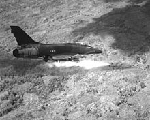 Airplane Picture - An USAF F-100D firing rockets in South Vietnam, 1967.
