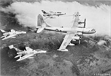 Airplane Picture - A USAF KB-50D of the 622d Air Refueling Squadron carrying out the first triple-point refuelling operation with three F-100Cs in 1956