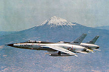 Airplane Picture - Two U.S. Air Force Republic F-105 Thunderchiefs, an F-105F-1-RE trainer and an F-105D-31-RE, with Mount Fuji, in the background.