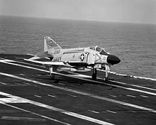 Airplane Picture - A U.S. Navy F-4J Phantom II BuNo 153769 of VF-31 lands on the USS Saratoga.