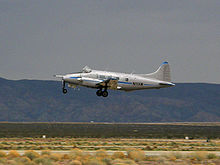Airplane Picture - Dove 6A belonging to the National Test Pilot School departs the Mojave Airport