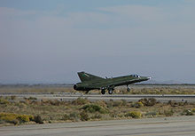 Airplane Picture - Ex-RDAF RF-35XD N217FR operated by the National Test Pilot School takes off from the Mojave Spaceport.