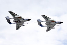 Airplane Picture - Two Sea Vixen FAW.1 aircraft (XJ571 & XN694) of 899 Sqn, one refuelling the other at a 1960s Farnborough Air Show