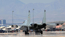 Airplane Picture - The tail section of the Su-30MKI showing the TVC nozzles and horizontal stabilizers.