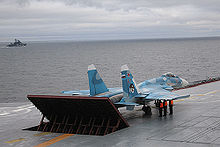 Airplane Picture - Su-33 being prepared for take-off on the Admiral Kuznetsov.