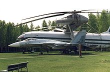 Airplane Picture - Su-27 (T-10) in front of a Mil Mi-12.