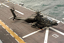 Airplane Picture - A US Army Apache aboard USS Nassau during Joint Shipboard Weapons and Ordnance training