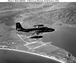 Warbird Picture - A US Navy F2H-2 Banshee flying over Wonsan, North Korea, 1952