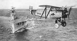 Fairey Flycatcher of 401 Flight over HMS Eagle, 1930