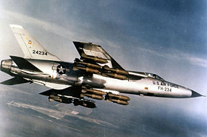 Warbird Picture - A Republic F-105D-30-RE Thunderchief in flight with a full bomb load of sixteen 750 lb bombs on its five hardpoints.