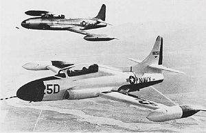 Warbird Picture: A T2V-1 (T-1A) SeaStar (foreground) and a TV-2 (T-33B) Shooting Star in flight in the early 1950s