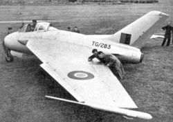Warbird Picture - The first DH 108 built - TG283. The torpedo-shaped objects on the wing tips are containers for anti-spin parachutes.