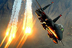 Airplane Pictures - An F-15E Strike Eagle from the 391st Expeditionary Fighter Squadron at Bagram Air Base, Afghanistan, launches heat decoys during a close-air-support mission over Afghanistan, 15 December 2008