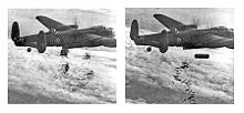 Warbird Picture - Lancaster B I NG128 dropping its load over Duisburg on 14 October 1944. The aircraft is carrying Airborne Cigar (ABC) radio jamming equipment, as shown by the two vertical aerials on the fuselage