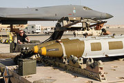 Airplane Pictures - Crew members transfer a 2,000 pound (900 kg) GBU-31 Joint Direct Attack Munition (JDAM) to a lift truck for loading onto a B-1B on 29 March 2007, in Southwest Asia in support of combat operations