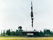 airplane pictures - B-52H 61-0026 Czar 52 about to crash; note the escape hatch detaching during the co-pilot's ejection sequence is visible near the tip of the leading edge of the tail.