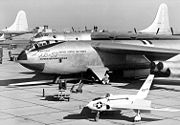 airplane pictures - XB-52 Prototype on flight line (X-4 in foreground)