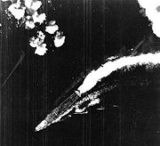 B-17 attack misses Hiryū; this was taken some time between 0800-0830. A Shotai of three Zeros is lined up near the bridge. This was one of several CAPs (Combat Air Patrols) launched during the day