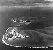 Midway Atoll, several months before the battle. Eastern Island (with the airfield) is in the foreground, and the larger Sand Island is in the background to the west