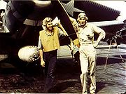 Ensign George Gay (right), sole survivor of VT-8's TBD Devastator squadron, in front of his aircraft, 4 June 1942
