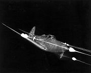 Bell P-39 Airacobra firing all weapons at night