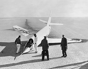 Airplane Picture - Bell X-2 #2 with a collapsed nose landing gear, after landing on the first glide flight, on 22 April 1952 at Edwards Air Force Base.