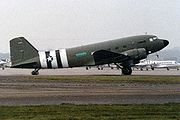 Airplane Pictures - C-47 in USAAF markings with invasion stripes, Rotterdam 1985