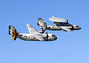 Airplane Pictures - A C-2A Greyhound and an E-2C Hawkeye from the USS Abraham Lincoln (CVN-72) in 2005.