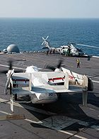 Airplane Pictures - A C-2A prepares to launch off the flight deck of the USS Abraham Lincoln (CVN-72) in support of Operation Unified Assistance, the humanitarian operation effort in the wake of the Tsunami that struck South East Asia.