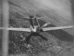 The CA-15 piloted by Flt Lt J.A.L. Archer. Photographed from the rear turret of a Lincoln bomber over Melbourne