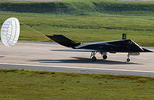 Airplane Picture - An F-117A during landing employing a drag-chute.