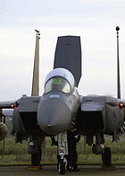 Airplane picture - A wing over maneuver displays the clean lines and high-wing design of an F-15E from Elmendorf AFB, AK.