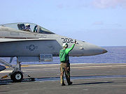 Airplane Pictures - FA-18 attached to catapult on the flight deck of USS Abraham Lincoln