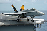 Airplane Pictures - An FA-18 taking off from USS Kitty Hawk.