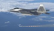 Airplane Pictures - An F-22 fires an AIM-120 AMRAAM