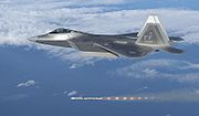 Airplane Pictures - An F-22 fires an AIM-120 AMRAAM