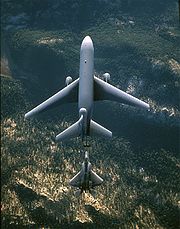 Airplane Pictures - A KC-10 Extender (top) refuels an F-22 Raptor