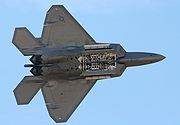 Airplane Pictures - To maintain stealth, the F-22 carries its weapons in internal bays, here shown open