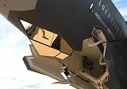 Airplane Pictures - EOTS under the nose of a mockup of the F-35
