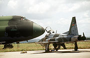 Airplane picture - Kenya Air Force F-5E Tiger II and an USAF C-5 Galaxy in the background
