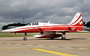 Airplane picture - Swiss Air Force F-5E Tiger II of the Patrouille Suisse aerobatics team arriving at RIAT 2008, England.