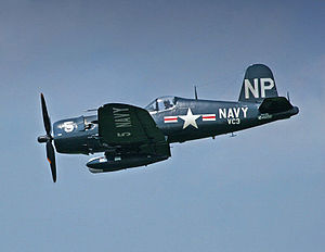 Airplane Pictures - An F4U-5NL, previously of the Honduran Air Force, at the Geneseo Airshow, with air intercept radar pod on right wing