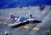 Warbird picture - An F9F-6 of VF-24 on the USS Essex in 1955