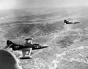 Warbird picture - Airplane picture - Two F9F-2Bs of VF-721 over Korea.