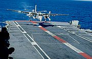 Tracker 848 about to take the wire aboard HMAS Melbourne, 1980