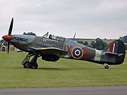 Warbird picture - Hawker Hurricane Mk IIC PZ865 (Battle of Britain Memorial Flight), the last Hurricane produced. It is in the "Night Intruder" scheme of the aircraft of Czech pilot Karel Kuttelwascher of 1 Squadron in 1942.