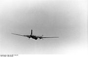 Warbird picture - A He 177s outline in flight, heading away from the camera.