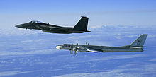 Airplane Picture - An F-15C Eagle intercepting a Russian Tu-95MS off the west coast of Alaska on 28 September 2006.